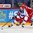 HELSINKI, FINLAND - DECEMBER 29: Russia's Yevgeni Svechnikov #7 goes to play the puck while trying to fend off Dmitri Buinitski #10 of Belarus during preliminary round action at the 2016 IIHF World Junior Championship. (Photo by Andre Ringuette/HHOF-IIHF Images)

